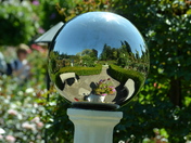 Butchard Gardens reflected in a round glass