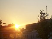 Sun lurking from behind Scotia Building Belleville
