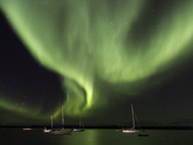 Sailing beneath the Aurora Borealis