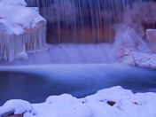Sunset reflectiosn in waterfall