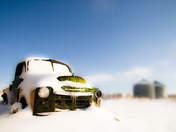 abandoned truck in the snow