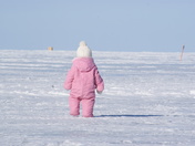 Grandaughter walking on the frozen Lake Simcoe.