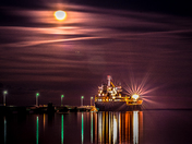 Long exposure night shot of boat and dock