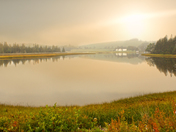 morning over an idyllic lake and hillside 