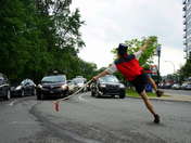 Circus artist in intersection.