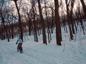 Snow cyclist.