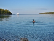 Swimming in pristine water of Little Cove. Bruce Peninsula National Park, ON.