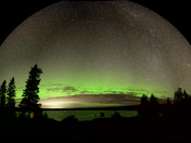 Snow-globe style Night Sky with Northern Lights and the Milky Way