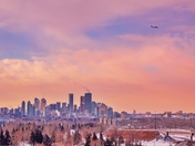 Airplane Over The City