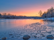Sunrise Reflections On An Icy Bow River