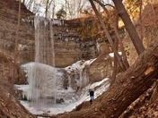 Boy with his dog at Tew's waterfall.