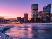 Sunrise Over A Wintry Downtown Bow River