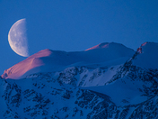Moon setting in Alpen Glow
