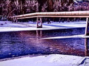 Snowy Bridge Walk By The Bow River 