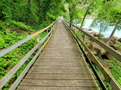 Boardwalk by River rapids