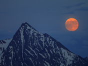 Strawberry Moon rising over Mt Loki in BC 