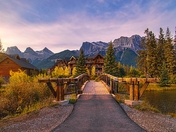 Bridge Walkway Through A Canmore Park