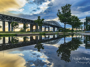 Skyway bridge puddle reflection