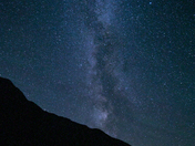 Milky way over a mountain