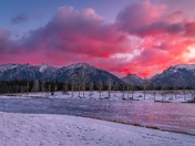 Sunrise Over A Frozen Quarry Lake