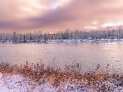 Sunrise Over A Snowy Bow River