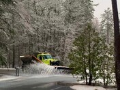 Tuesday morning snow(water)plow at work in North Conway.