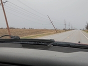 Power poles snapped just East of Madrid. 