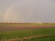 Lighting in rainbow, after storm in Ames on 4/23/22