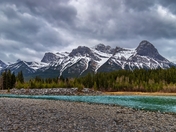 Moody Clouds Over Canmore Mountains