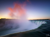 Red dragon over waterfall