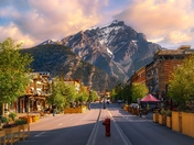 Mountain Road Through The Banff Town At Sunrise