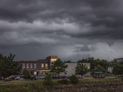 The Garcelon Civic Centre under stormy skies