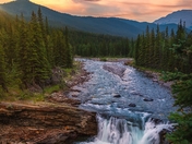 Summer Sunrise Over Sheep River Falls