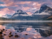 Sunrise Clouds Over Mountains At Bow Lake