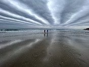 Walking on the Beach on a Cold Day