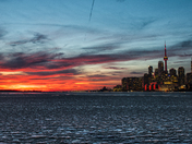 red cloud lighted up Toronto sky