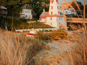 Late afternoon lighthouse bathed in golden light