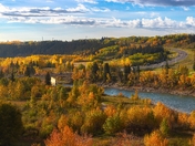 Fall Trees Framing The River Valley