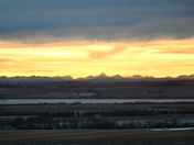A Rocky Mountain Sunset From A Distance