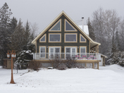 Chalet in Winter Storm Panorama