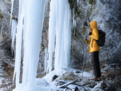 Exploring behind ice waterfalls