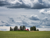Little Red Barn under an Alberta sky