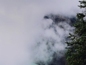 Fog lifts over Lake Louise