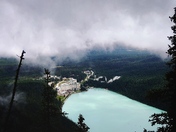 Fog lifts over Lake Louise