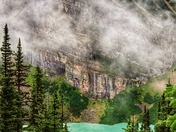 Fog lifts over Lake Louise