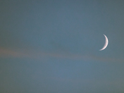 Waxing crescent moon. With a beautiful Post-sunset backdrop!