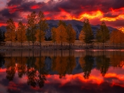 Fiery Sunrise Reflecting On Quarry Lake