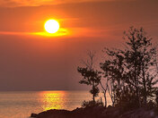 Sunset to the Left of Me, Storm to the Right.  Here I am Stuck in the Middle with ...