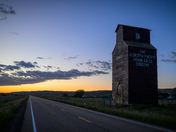 Warm light and a dark road through Dorothy