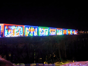 CPKC Holiday Train crossing the High Level Bridge